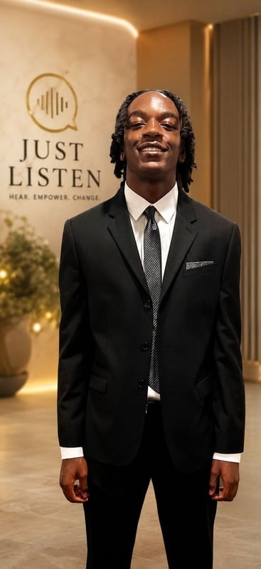 Koi James Young standing in the Just Listen space